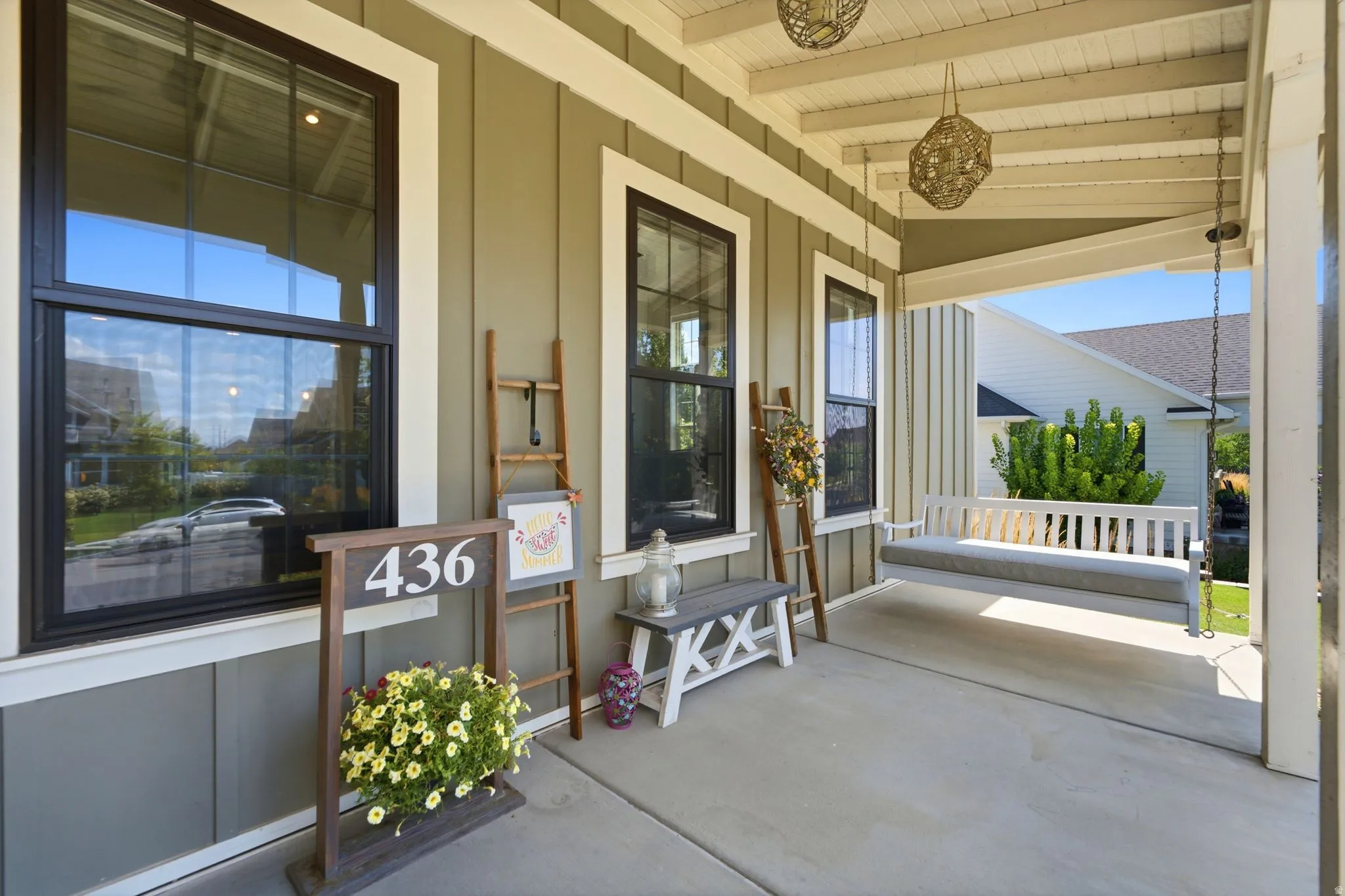 Inviting covered porch with fun swing