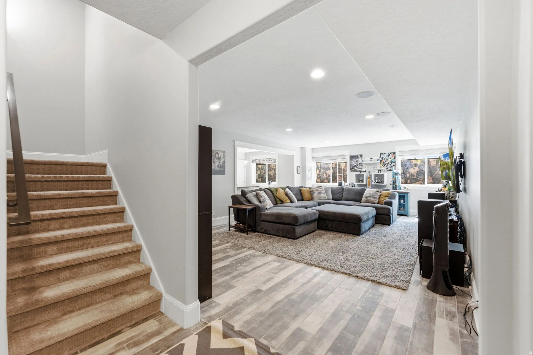 Great room-view of stairs going to 2nd level