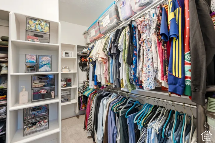 Primary suite walk-in closet 1
