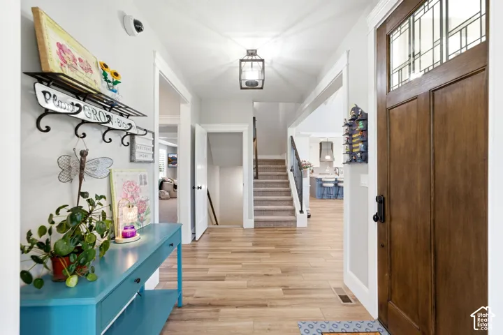 Solid wood entry door brings you into entryway