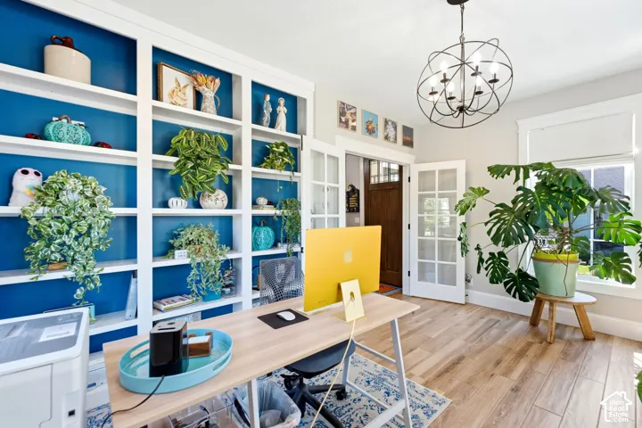 Office-right off entryway with built-in shelving