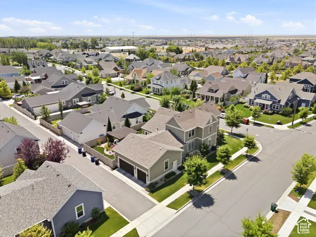 Residential neighborhood with varied architectural styles and well manicured landscaping