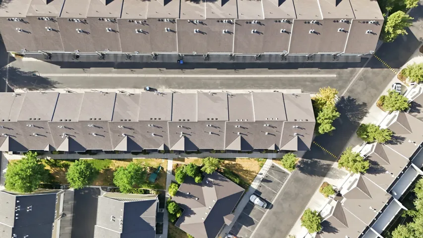 Aerial perspective showcasing residential rooftops with consistent architectural styling
