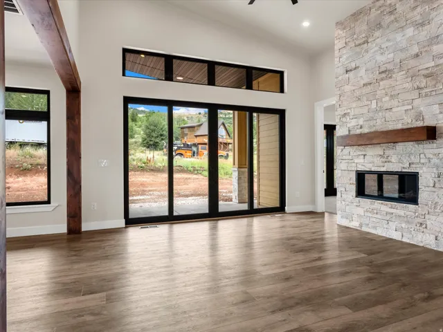 Vaulted ceiling with wood-finish flooring