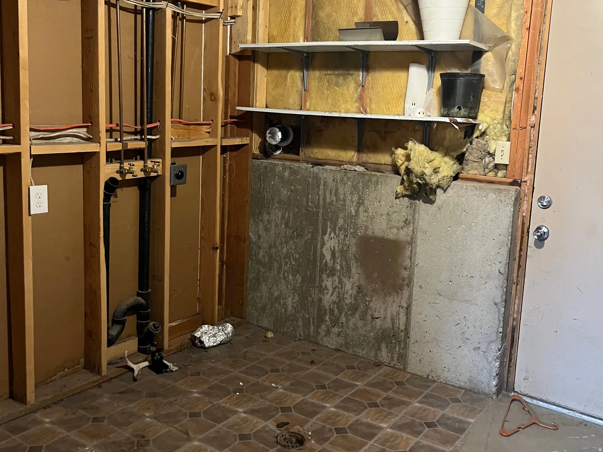 This is the laundry room and the basement entrance.