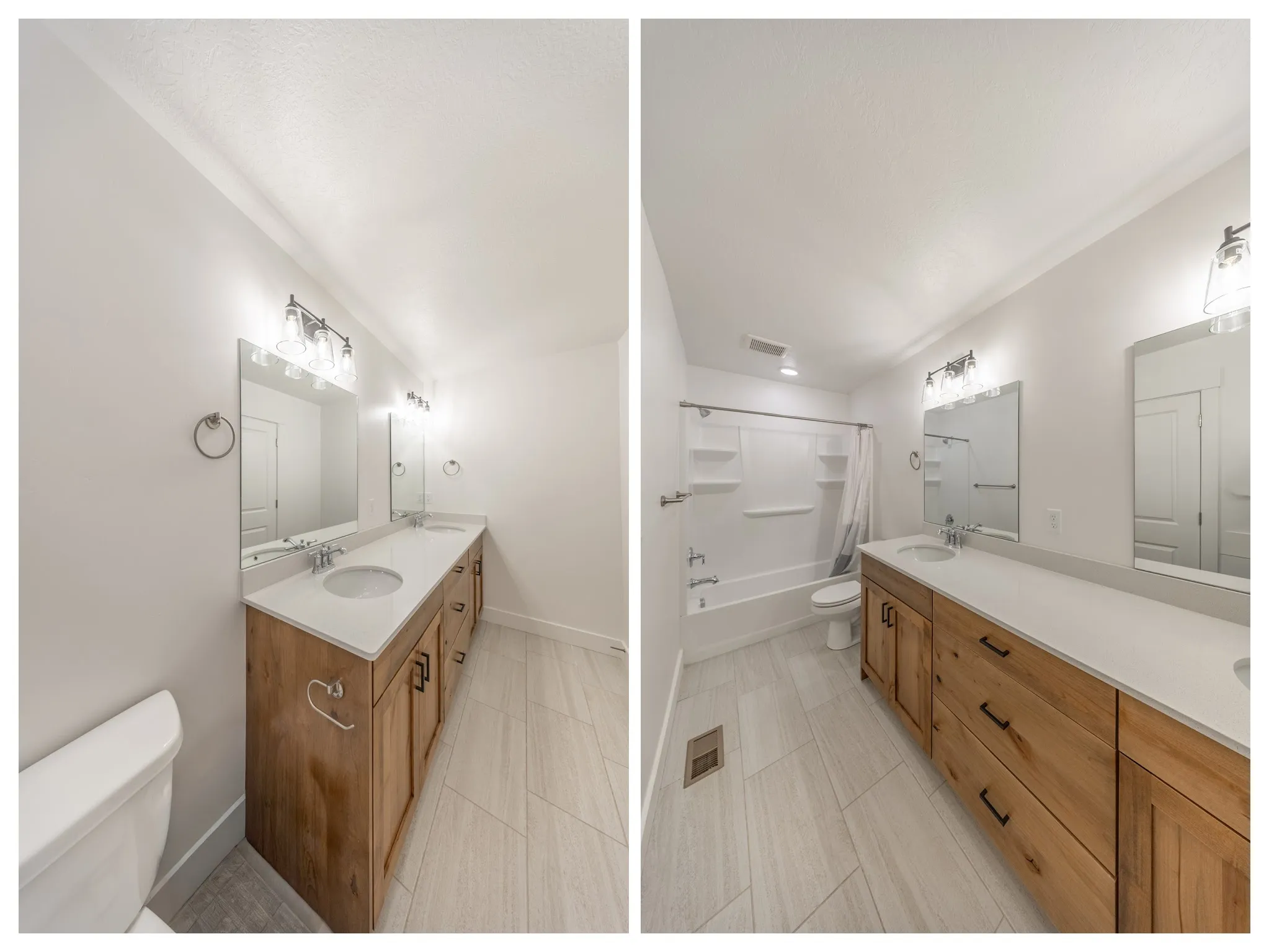 Bathroom featuring a dual vanity with wood-finish cabinetry, white countertops, two integrated sinks, and individual mirrors