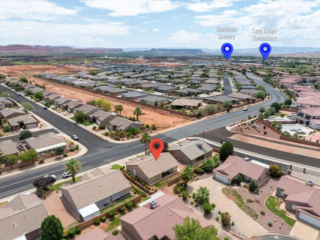 Aerial view showcasing a residential neighborhood with a variety of detached homes