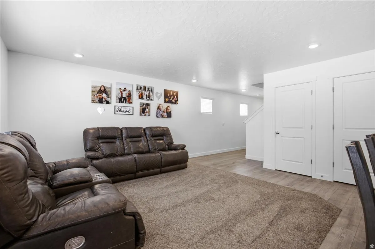 Spacious interior featuring recessed lighting and a neutral color palette