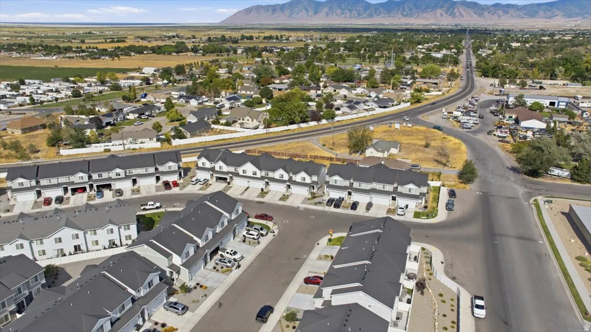 Newly constructed townhome community featuring contemporary architectural styles and attached garages
