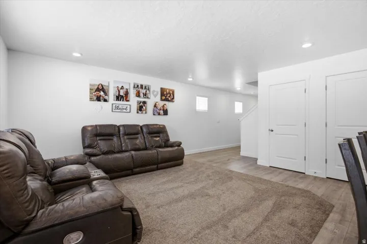 Spacious interior featuring recessed lighting and a neutral color palette