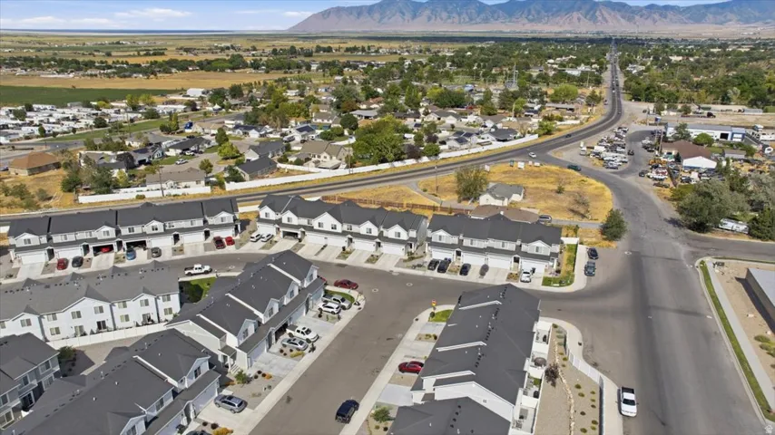 Newly constructed townhome community featuring contemporary architectural styles and attached garages