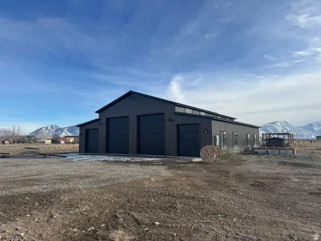 Modern industrial-style building featuring a dark metal exterior