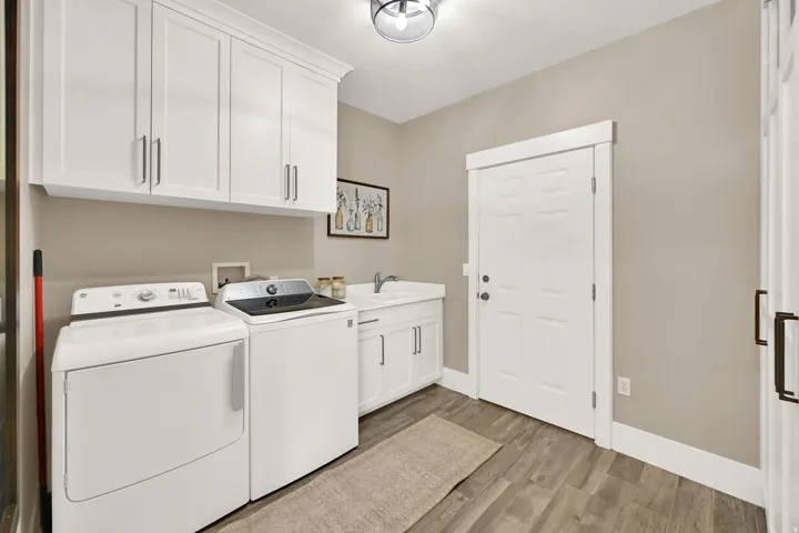 Laundry Main floor.  Door to Garage