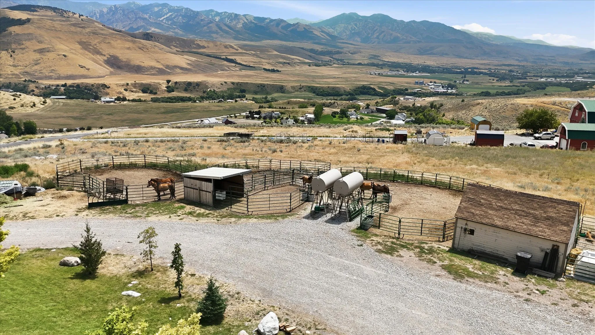 Gravel driveway with expansive mountain backdrop