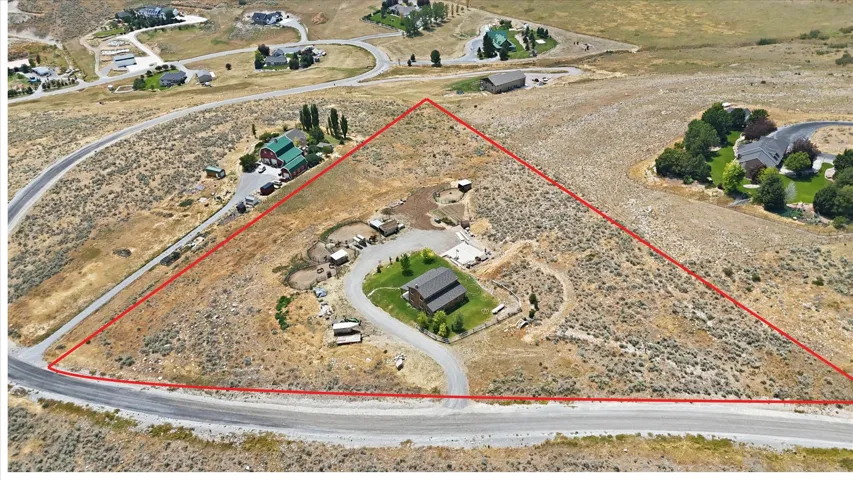 Expansive land parcel with direct gravel road frontage