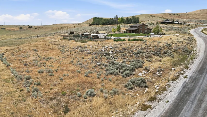 Expansive rural land parcel with a gravel road frontage
