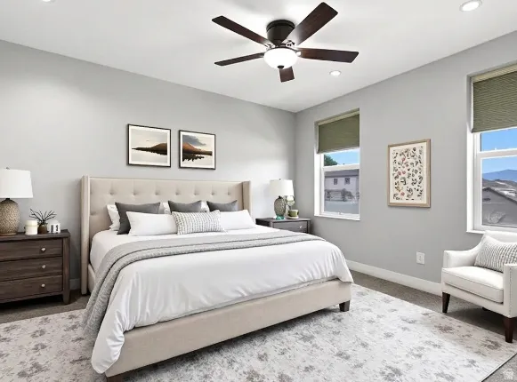 Room featuring light gray walls, recessed lighting, and a dark wood-finish ceiling fan with integrated light