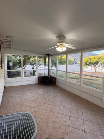 sunroom with pellet stove