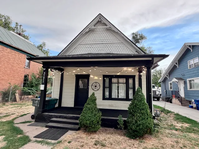Exterior facade featuring horizontal siding and dark trim accents