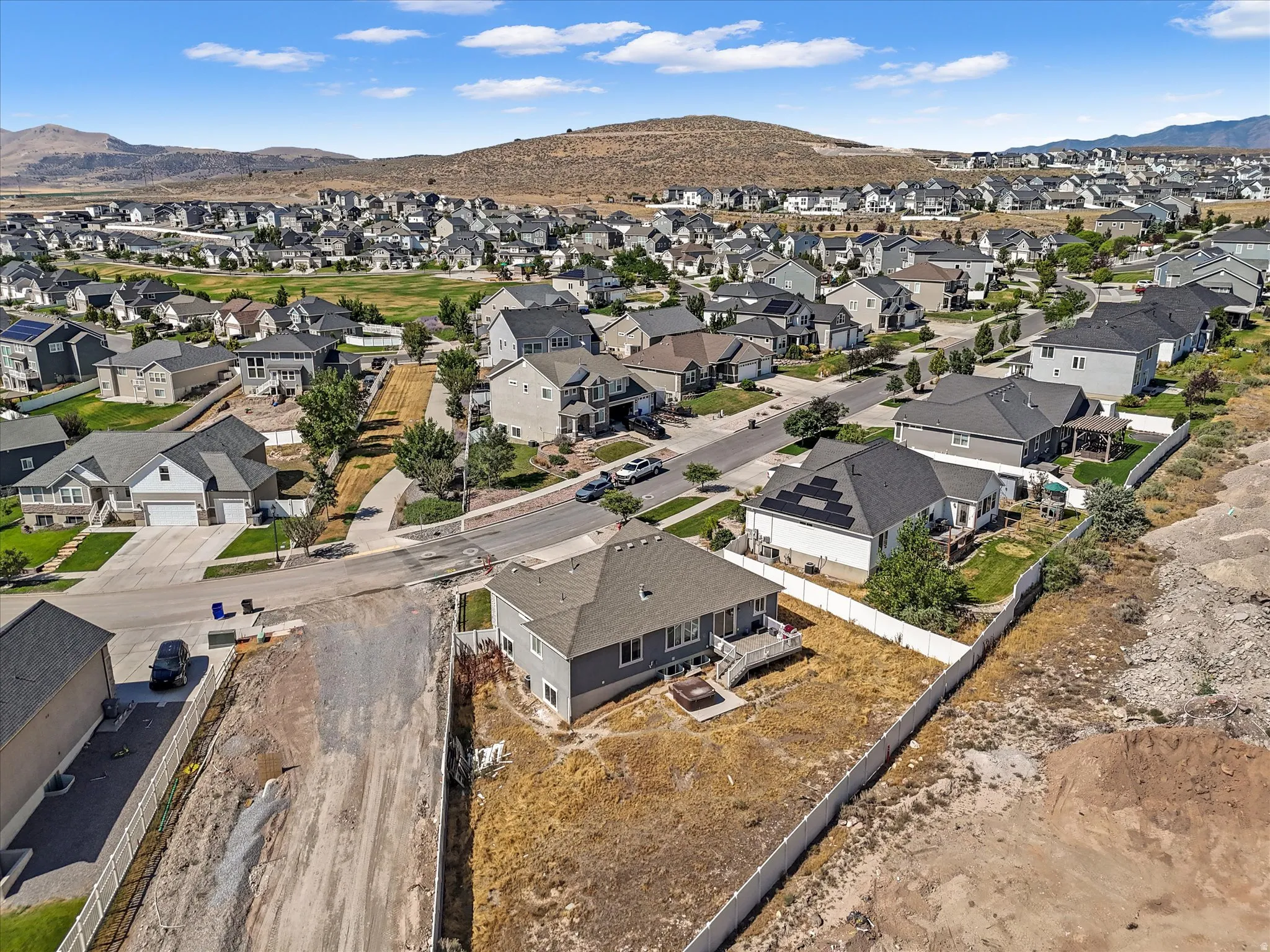 Aerial perspective showcasing a residential neighborhood with diverse housing styles