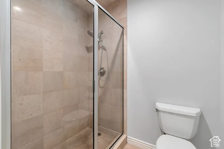 Primary bathroom with walk-in shower.