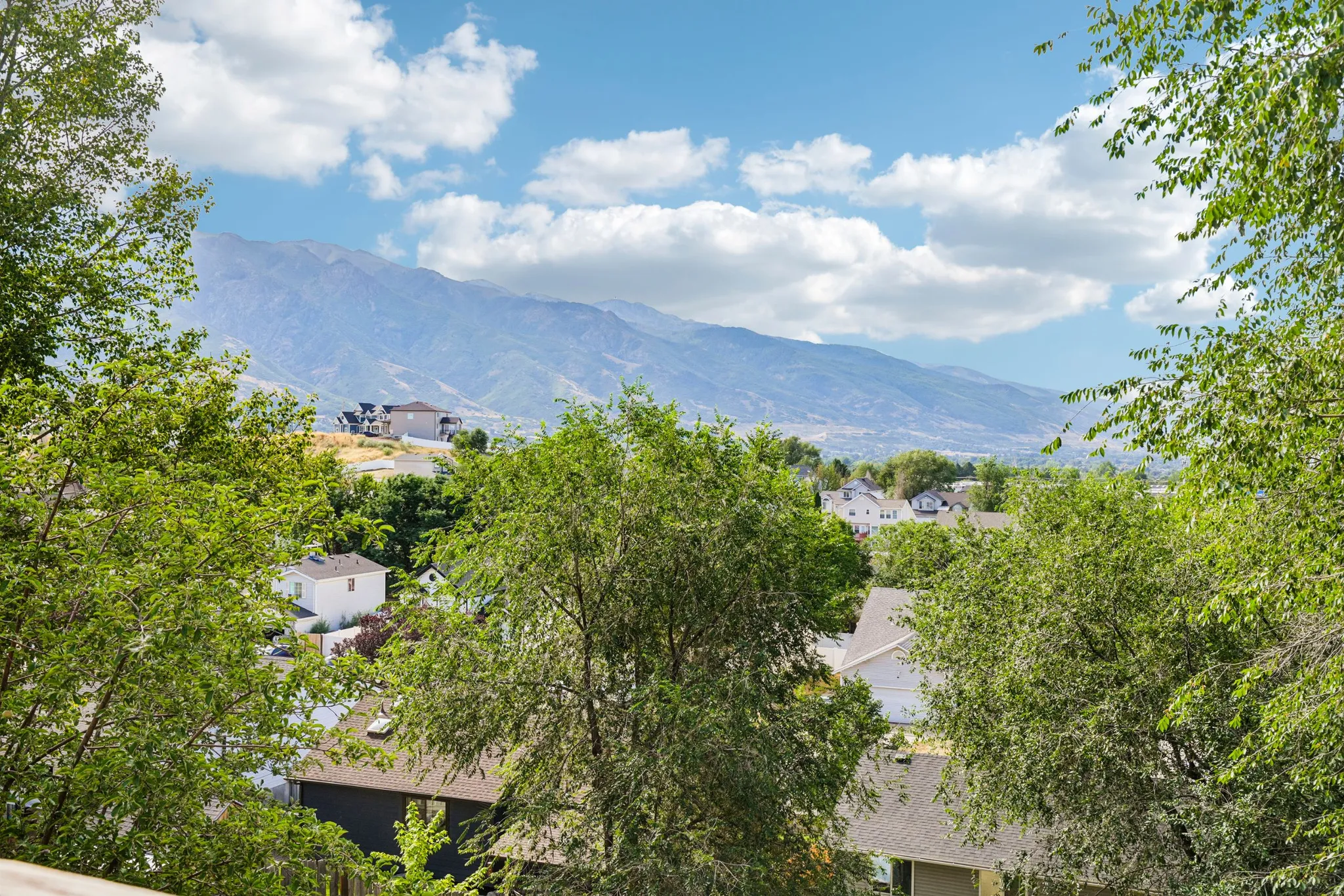 Distant mountain range backdrop with a residential area in the foreground