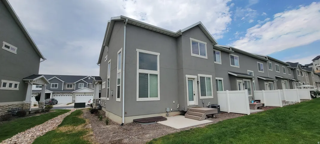 Contemporary stucco exterior with white trim accents