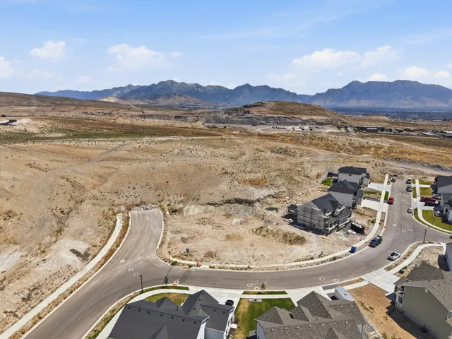 Expansive land parcel with surrounding residential development and paved roads
