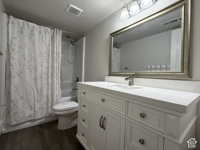 Full bathroom with custom cabinets