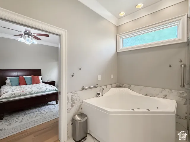 Primary ensuite bathroom with jetted tub