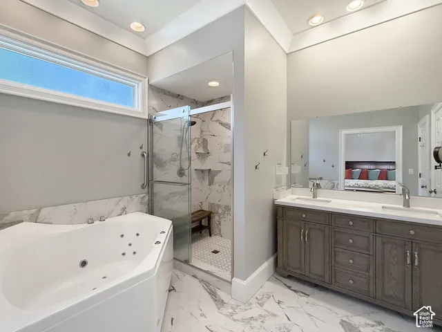 Primary ensuite bathroom with double sinks