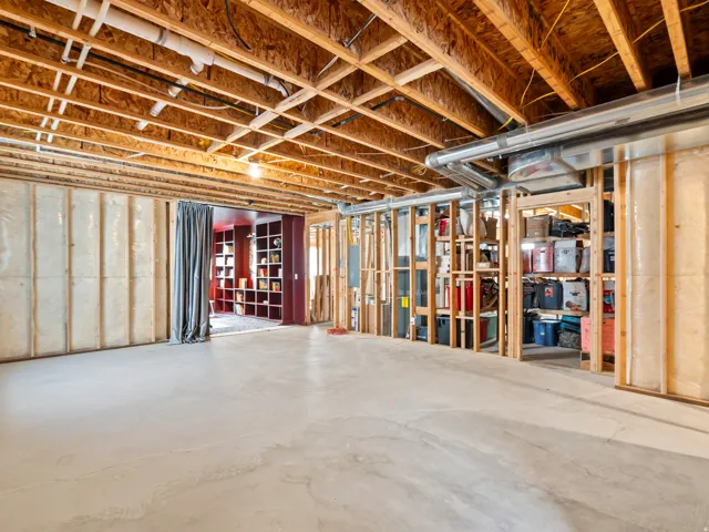 Unfinished basement offering expansive concrete flooring