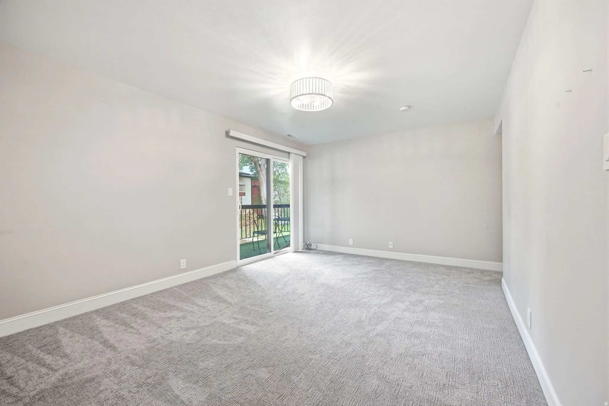 The bedroom has access to the patio.