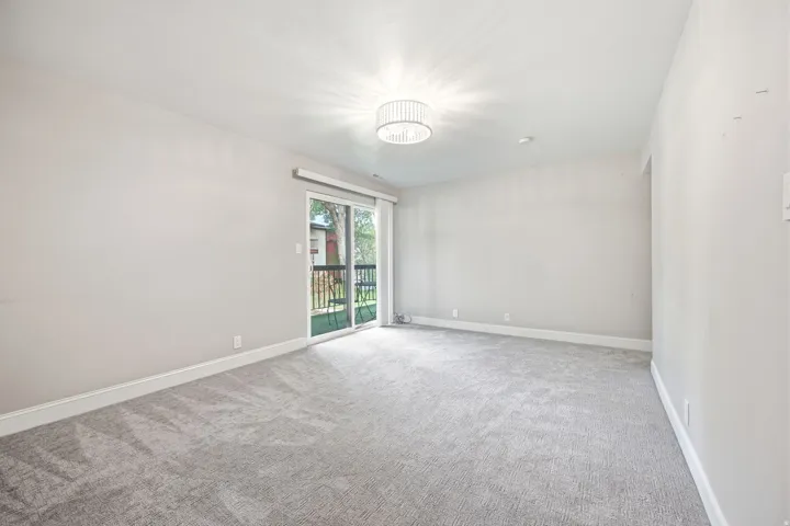 The bedroom has access to the patio.
