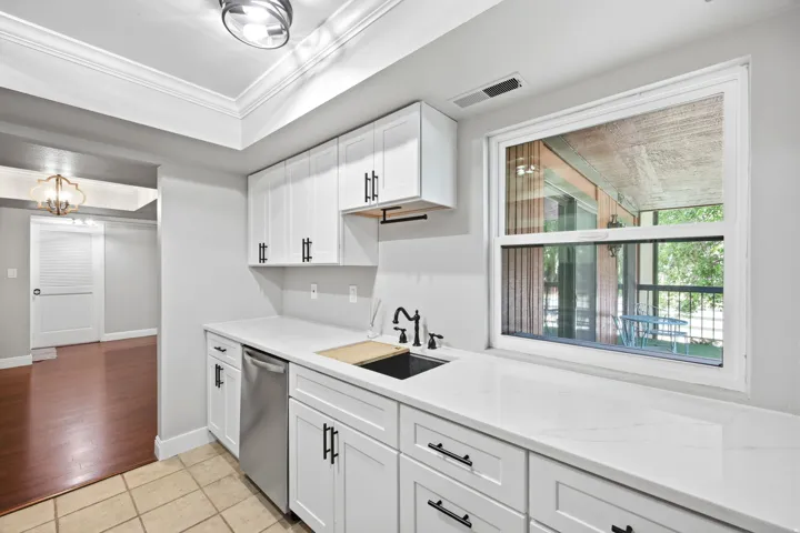 Kitchen has lots of light.