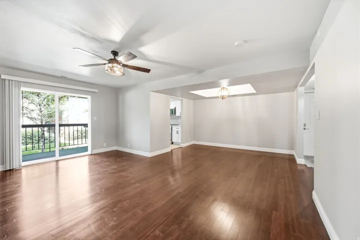 Spacious living area, lots of light, and access to a covered deck.