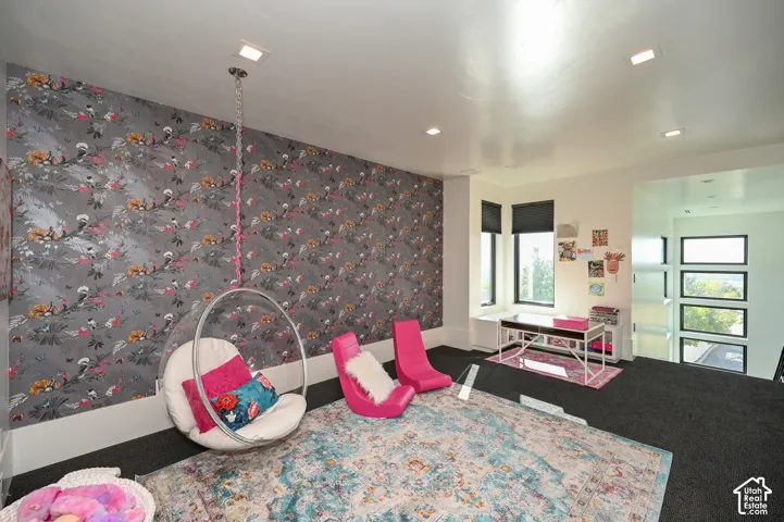 Accent wall featuring patterned wallpaper
