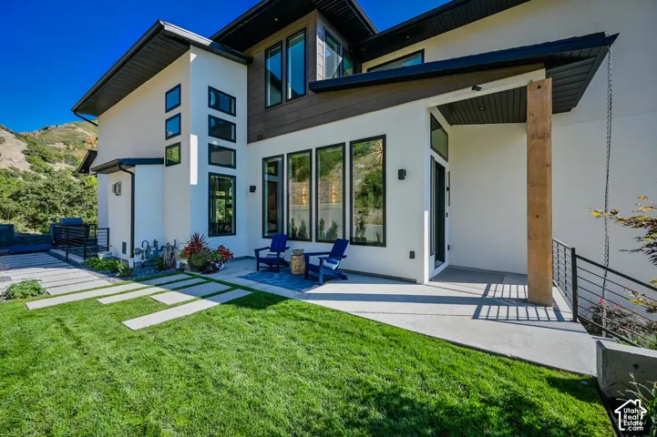 Modern architectural design with white stucco and wood-finish siding