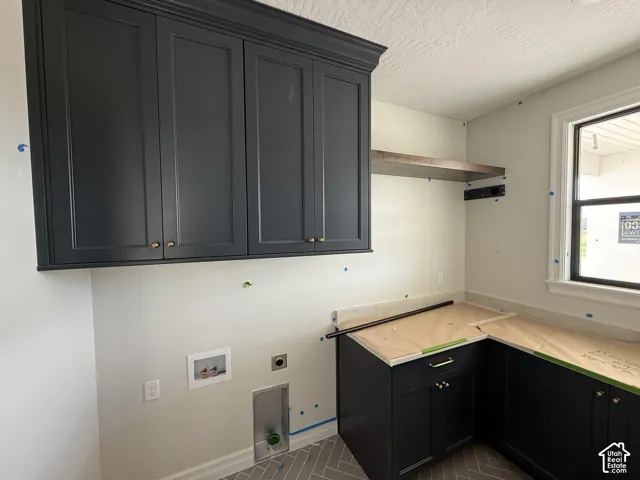 Dark cabinetry with gold-tone hardware