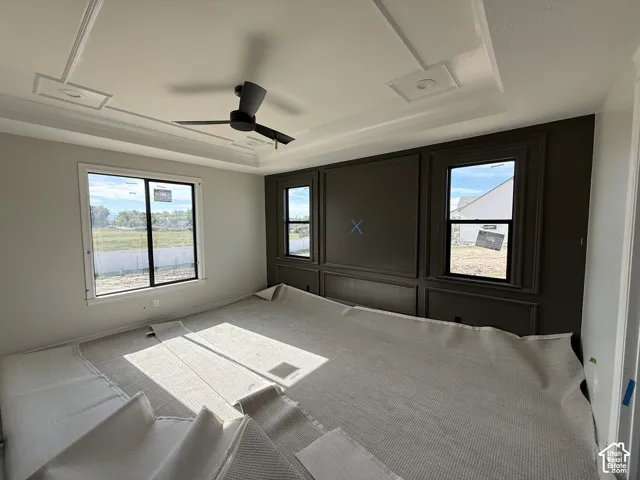 Tray ceiling with crown molding and recessed lighting