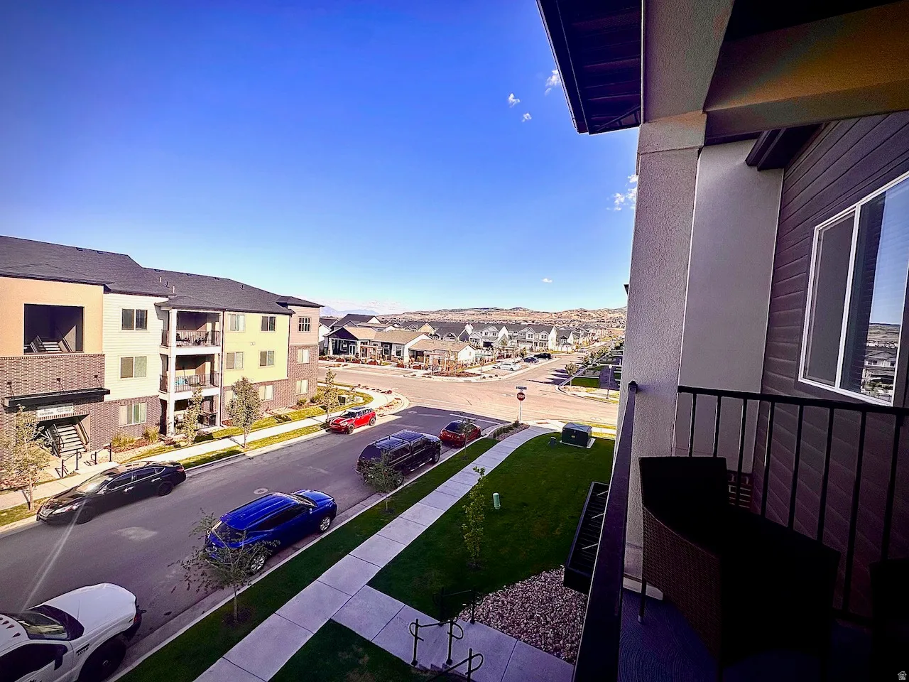 Private balcony with black metal railing