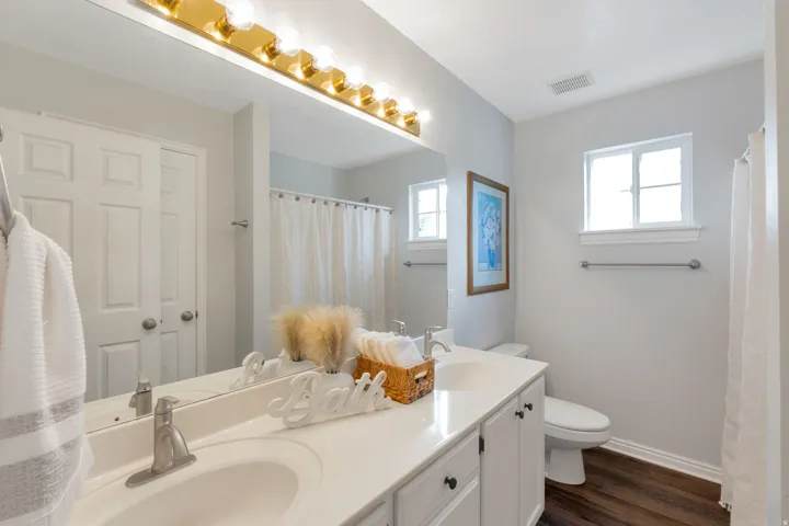 Double vanity with undermount sinks and brushed nickel faucets