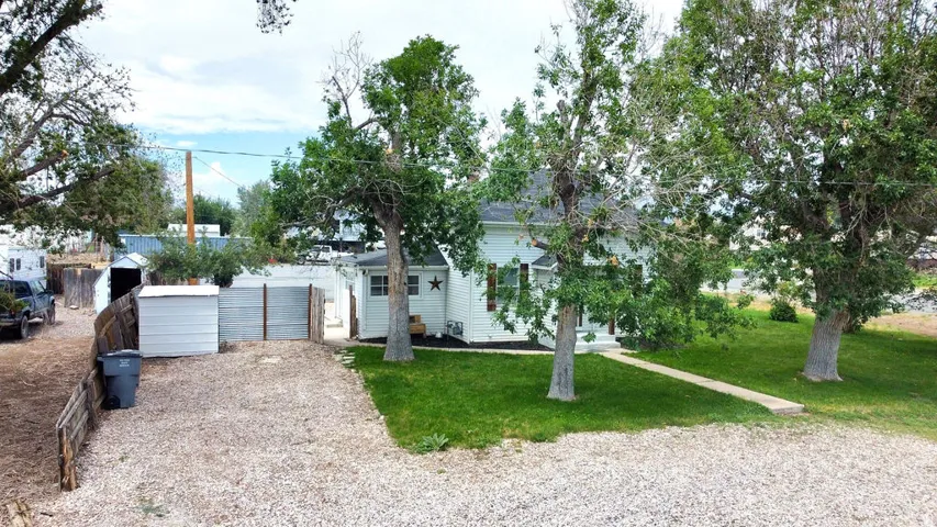 White exterior with a covered porch