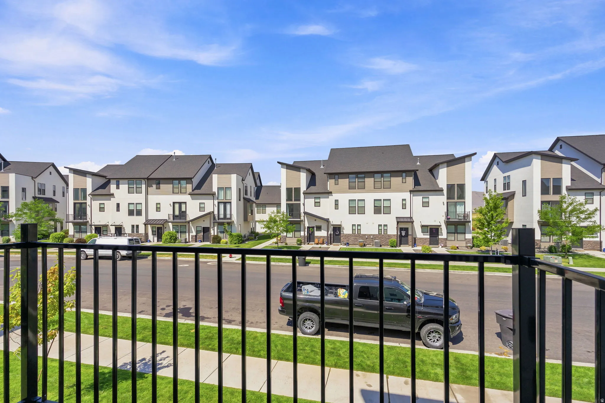 Contemporary townhome community featuring multi-story residences