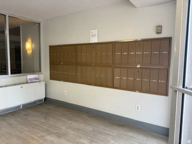Centralized mailboxes with individual compartments at the front entry