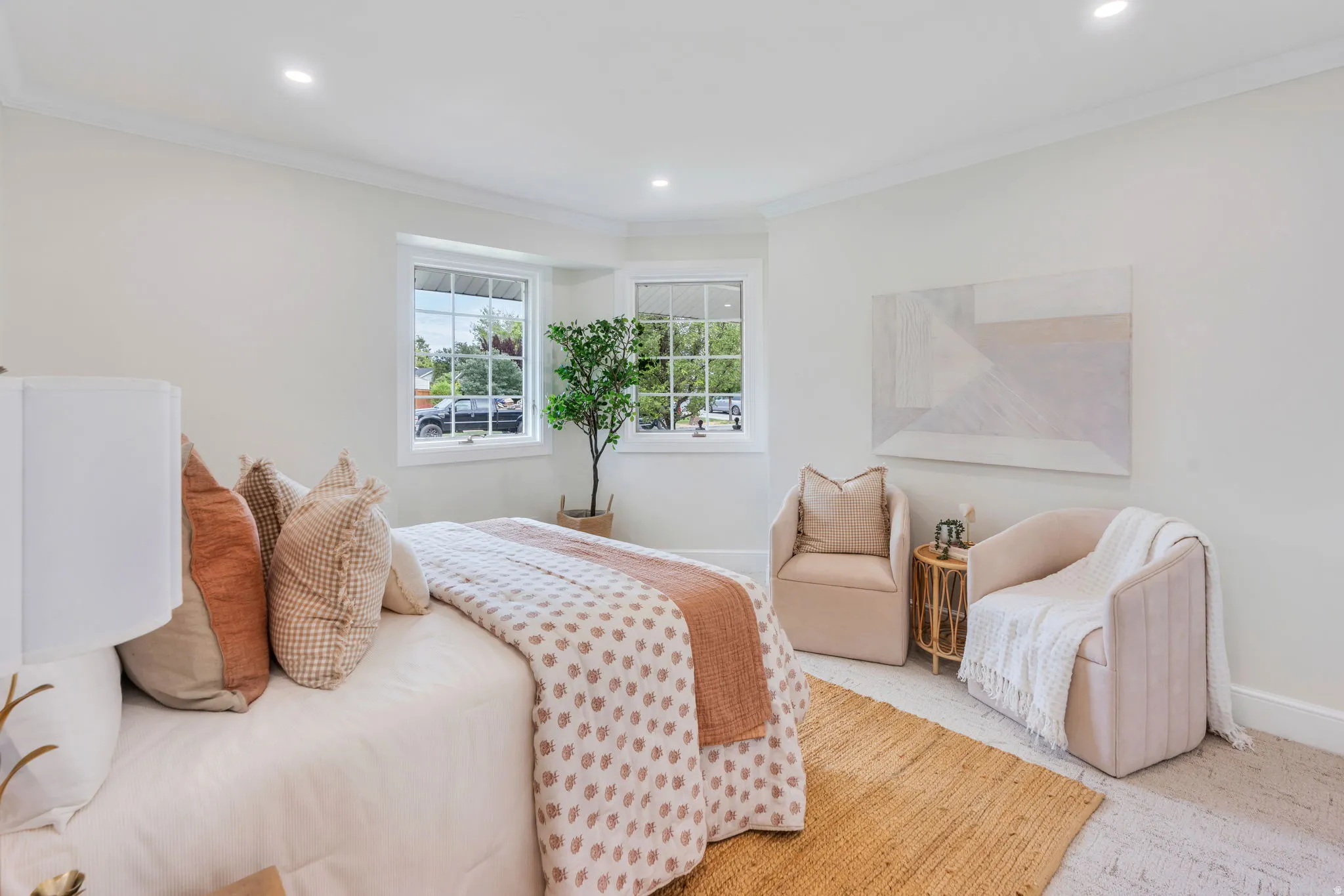 Bedroom featuring white walls, crown molding, recessed lighting, and dual windows