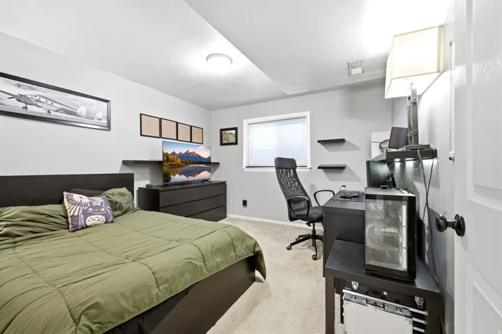 Light-colored walls and carpeting create a bright ambiance
