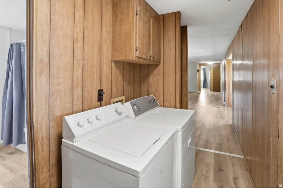 Dedicated laundry area featuring a washer and dryer
