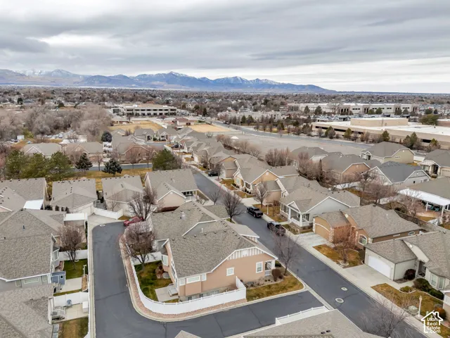 Residential neighborhood featuring a curvilinear street layout and a variety of detached homes