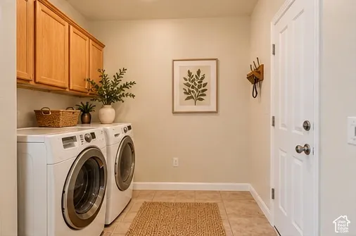Built-in upper cabinetry with wood-finish doors, tiled flooring, and a solid-core door with brushed nickel hardware